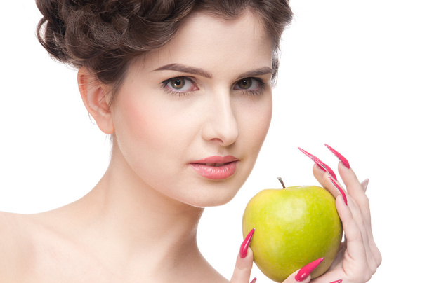 Close up portrait of beauty woman with green apple. - Фото, изображение