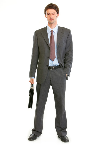 Full length portrait of modern businessman with briefcase - Фото, изображение