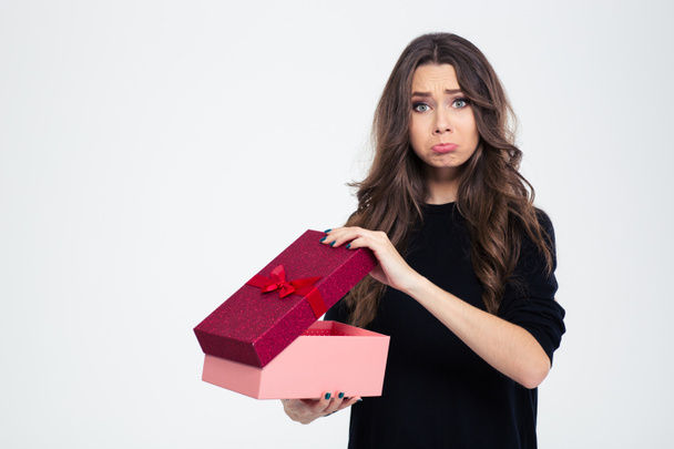 Sad woman standing with opened gift box - Φωτογραφία, εικόνα