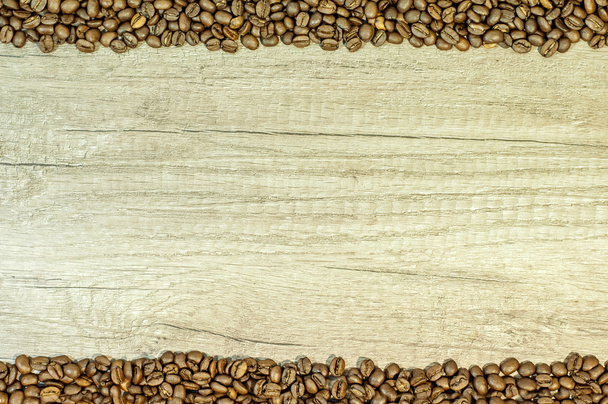 Coffee grains on kitchen table background with copy space - Photo, Image