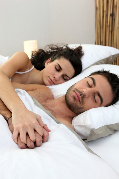 Couple asleep in bed - Photo, Image