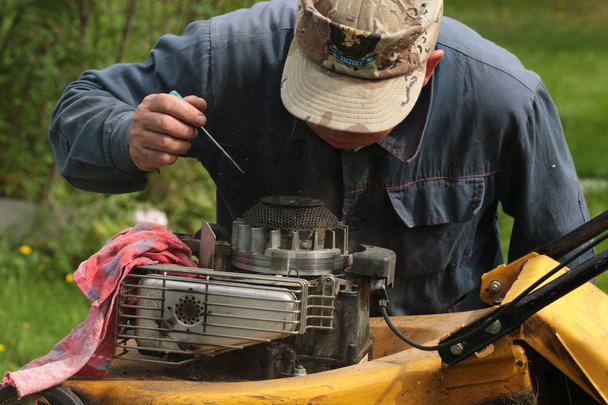 repairing lawn mower engine - Photo, Image