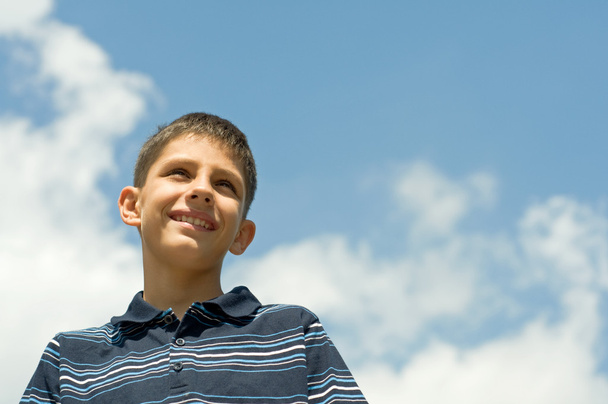 Boy at the clouds - Photo, Image