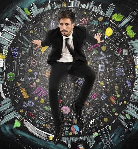 Бизнесмен, сидящий на круге символов
 - Фото, изображение