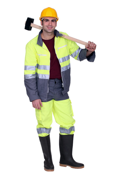 Construction worker with a sledgehammer - Fotoğraf, Görsel