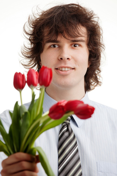 Man with flowers - Foto, Imagen