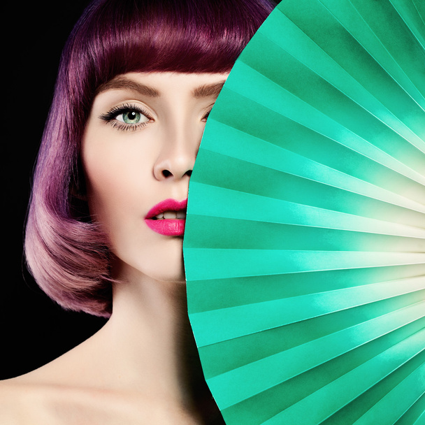 Beautiful Woman. Colorful Coloring Hair, Makeup and Green Paper - Photo, Image