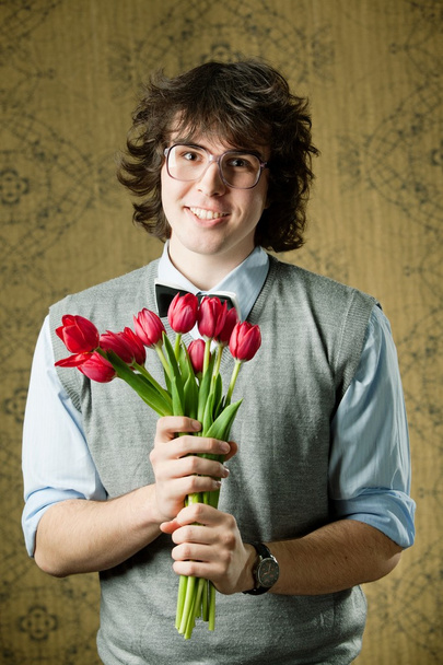 Student with flowers - Zdjęcie, obraz