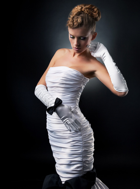 Bride blonde in white wedding dress and gloves - series of photos - Foto, afbeelding
