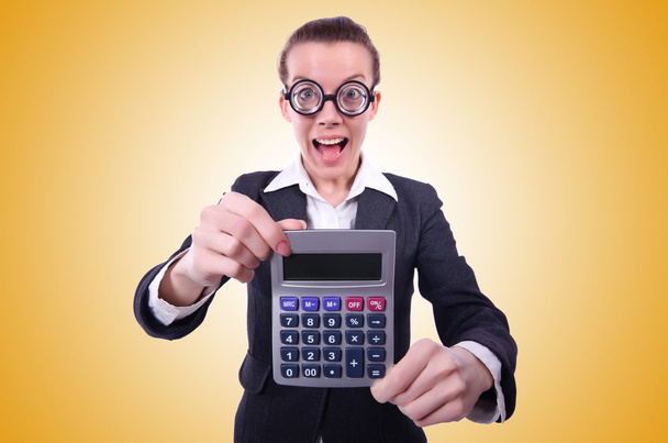 Нерд жінка бухгалтера з калькулятором
 - Фото, зображення
