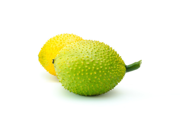 Gac fruit green and yellow on a white background - Fotoğraf, Görsel