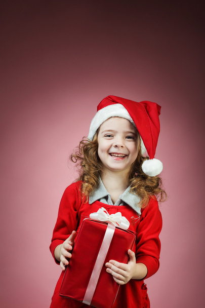 Happy little girl open red gift box - Photo, Image