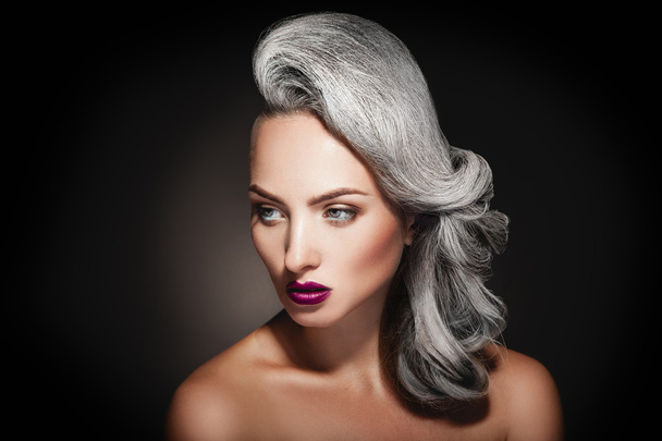 young woman with grey hair color and beautiful makeup in studio - Fotoğraf, Görsel