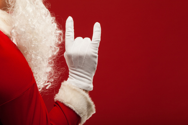 Фото з Дідом Морозом рукавичках вказуючи жест рукою. пальці - Фото, зображення
