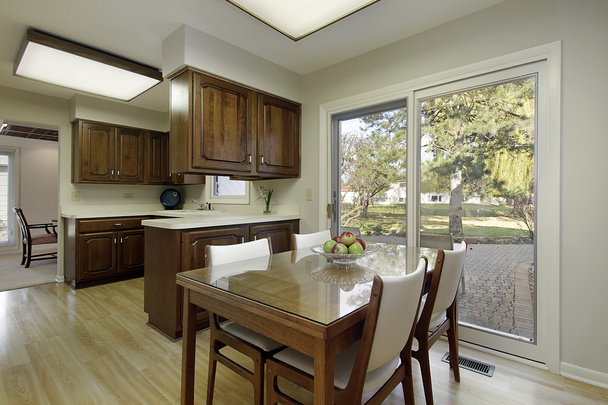 Kitchen with dark wood cabinetry - Photo, Image