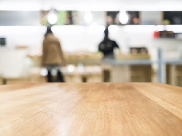 Piano tavolo con persone offuscate Retail Shop sfondo interno
 - Foto, immagini