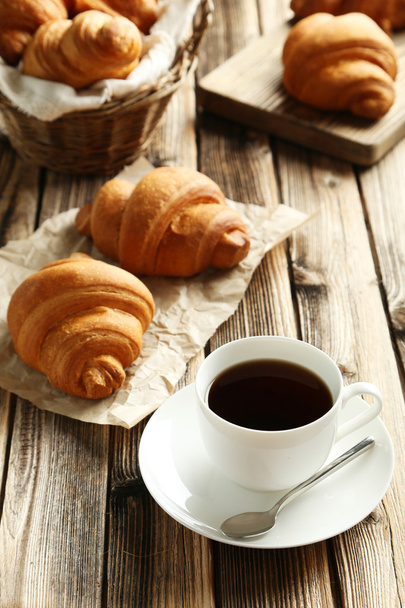 Tasty croissants with cup of coffee - Φωτογραφία, εικόνα