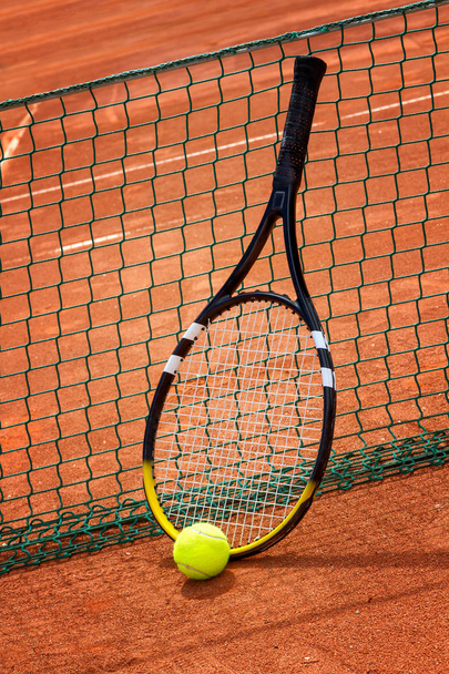Tennis racket and ball on the court. - Fotoğraf, Görsel