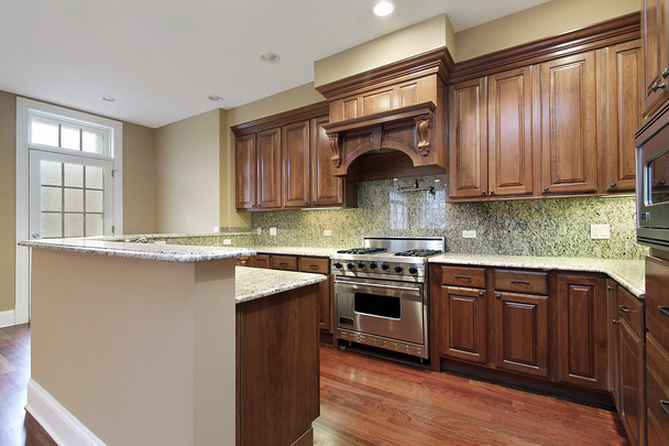 Küche mit Granit Backsplash - Foto, Bild