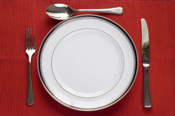 Plate, fork, knife and spoon - Foto, afbeelding