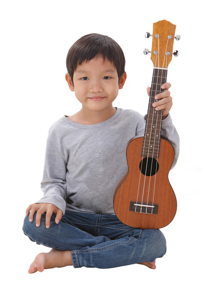 bambino con l'ukulele
 - Foto, immagini