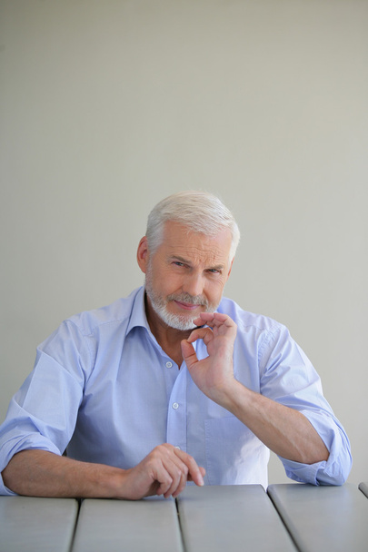 Elderly man giving the a-ok sign - Photo, image