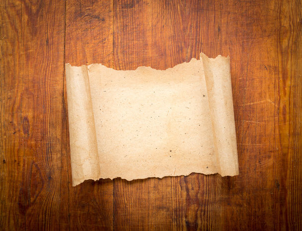 parchment scroll on wooden background - Photo, Image
