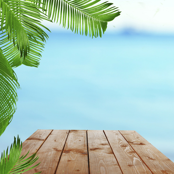 Wooden table with tropical paradise background - Photo, image
