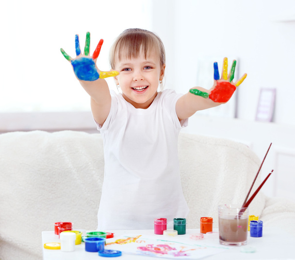 Little girl with hands in paint - Fotó, kép