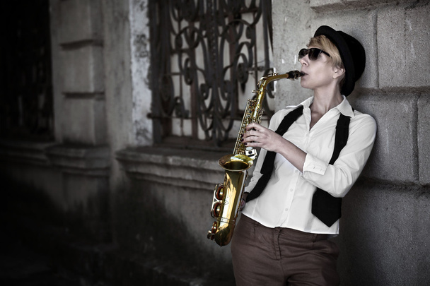 Girl with saxophone outside  - Zdjęcie, obraz
