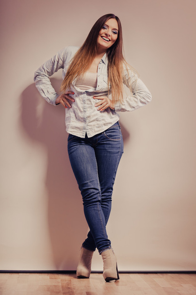 fashionable woman in shirt denim pants - Фото, зображення