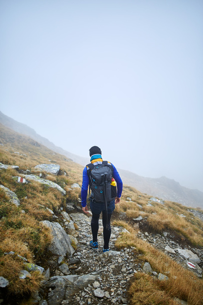Caucasian hiker with backpack - Fotó, kép