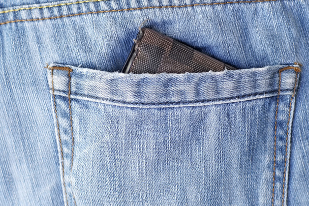 old wallet in back pocket jeans - Фото, зображення