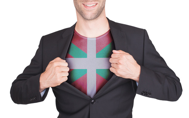Businessman opening suit to reveal shirt with flag - Photo, Image