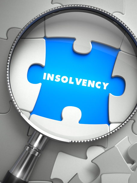 Insolvency - Missing Puzzle Piece through Magnifier. - Foto, afbeelding