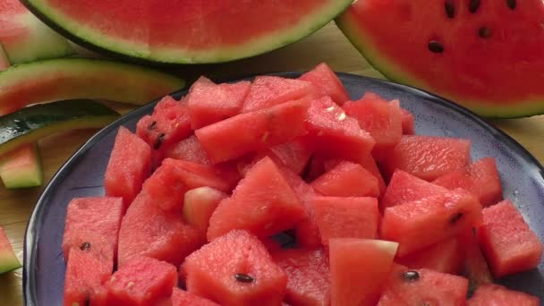 Fresh water melon pieces in blue bowl - Footage, Video