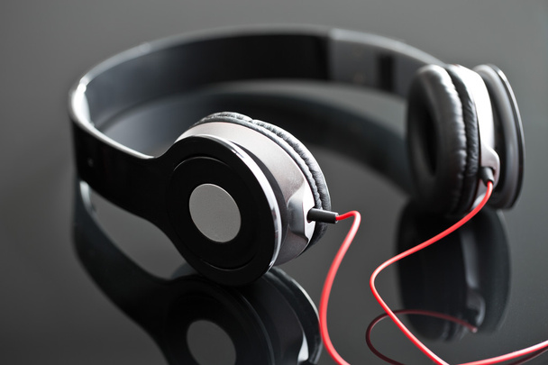 headphones on black table - Photo, Image