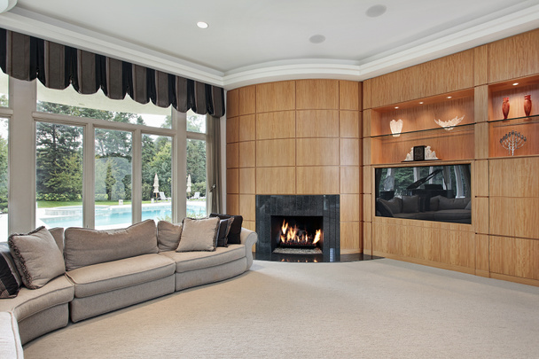 Living room with rounded fireplace - Photo, Image