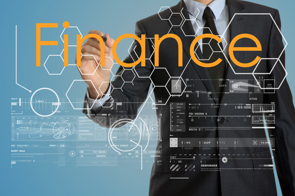 επιχειρηματία γράφοντας οικονομικών με ορισμένα μοντέρνα γραφήματα στην εικονική οθόνη - Φωτογραφία, εικόνα