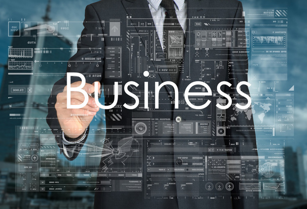 бизнесмен пишет Бизнес на прозрачной доске
 - Фото, изображение