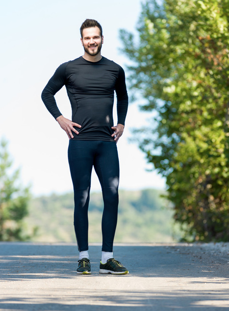 Portrait Of Male Runner in nature after jogging - Zdjęcie, obraz
