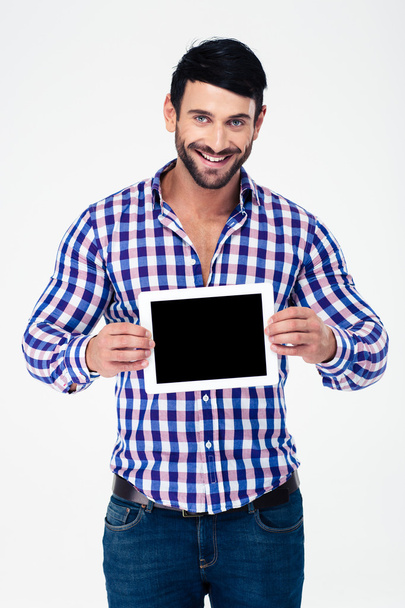 Portrait of a smiling man showing tablet computer screen - Fotoğraf, Görsel