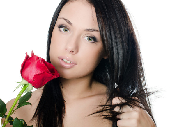 The girl with beautiful hair with a red rose - Photo, image