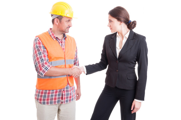 エンジニアとビジネス女性の握手 - 写真・画像