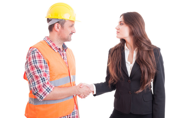 Builder and business woman shaking hands - Fotografie, Obrázek