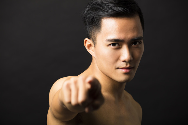 attractive young man face finger pointing - Photo, Image