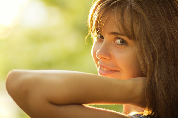 portrait of a beautiful young woman in sunlight - Foto, Imagem