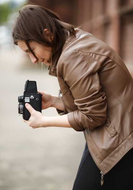 Woman photographer with vintage camera - Photo, Image