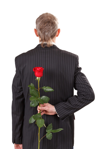 赤いバラを持つ男 - 写真・画像
