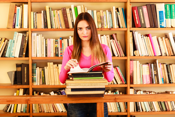 Girl student in college library - Photo, Image